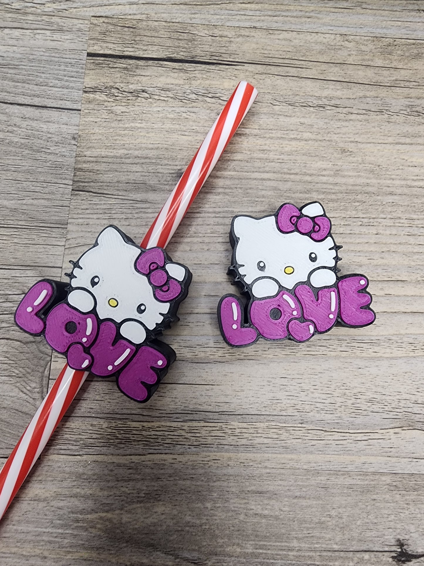 Plastic Hello Kitty with 'LOVE' in Purple Straw Topper